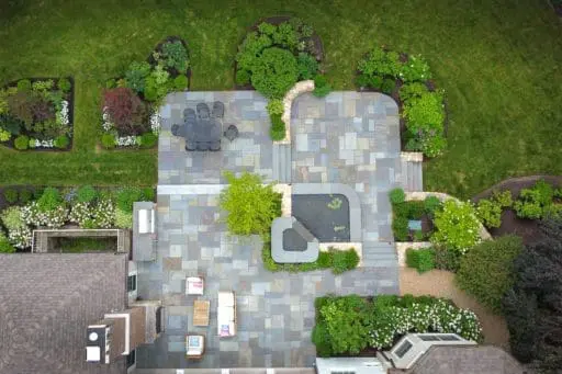 A drone captures a bird’s-eye view of the property, helping landscape designers study circulation, scale, grading, and the relationship between built and planted spaces.