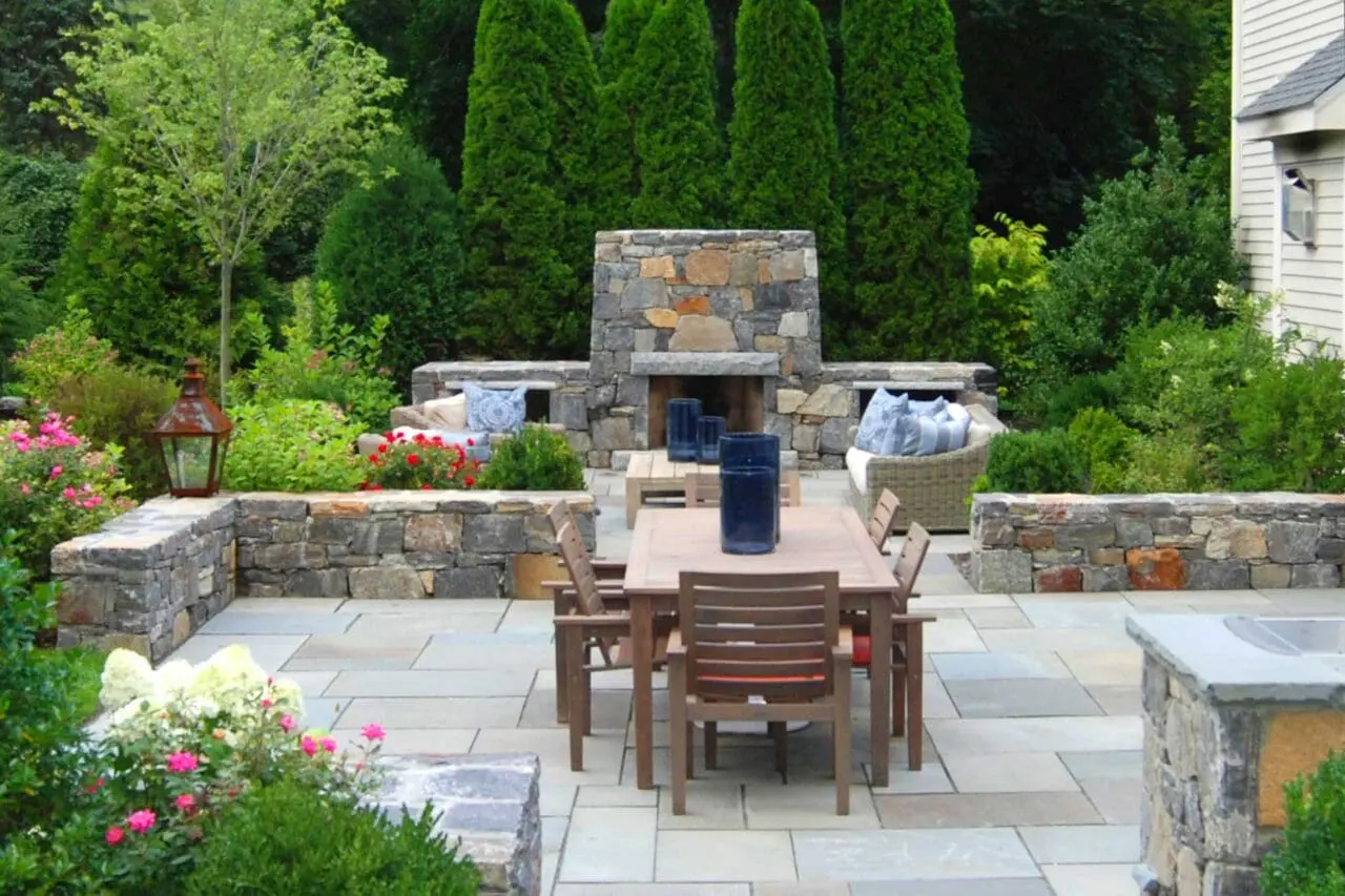 Dover, MA - Backyard patio designed for outdoor dining, with space for gathering, cooking, and enjoying meals in a comfortable residential setting.