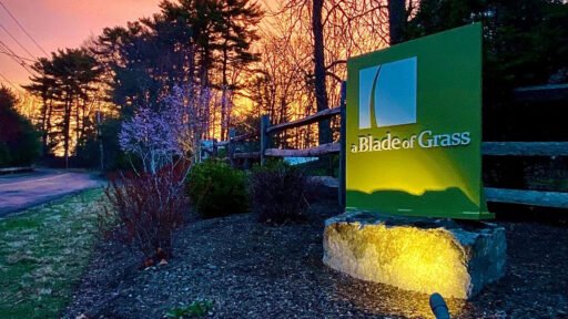 Sudbury, MA - The a Blade of Grass sign at our office reflects more than 30 years as a locally owned landscape design, construction, and maintenance company serving homeowners throughout Greater Boston.