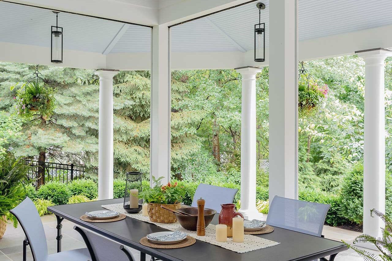 Wellesley, MA - Natural light, generous paving, and views into the surrounding landscape make this screened porch an inviting extension of the garden. photo credit: Michael J Lee