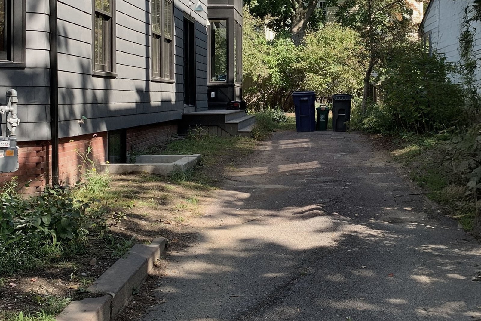 Cambridge driveway before paver and gravel renovation