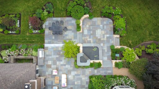 A drone captures a bird’s-eye view of the property, helping landscape designers study circulation, scale, grading, and the relationship between built and planted spaces.