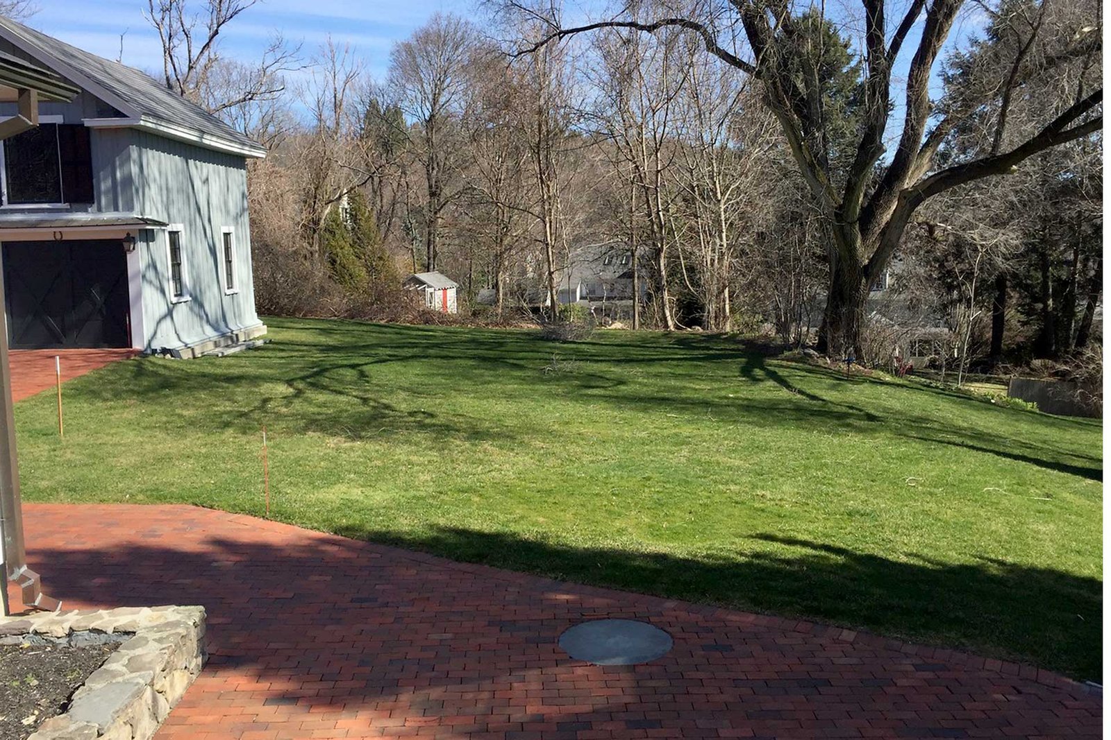 Belmont open lawn beside carriage house before renovation