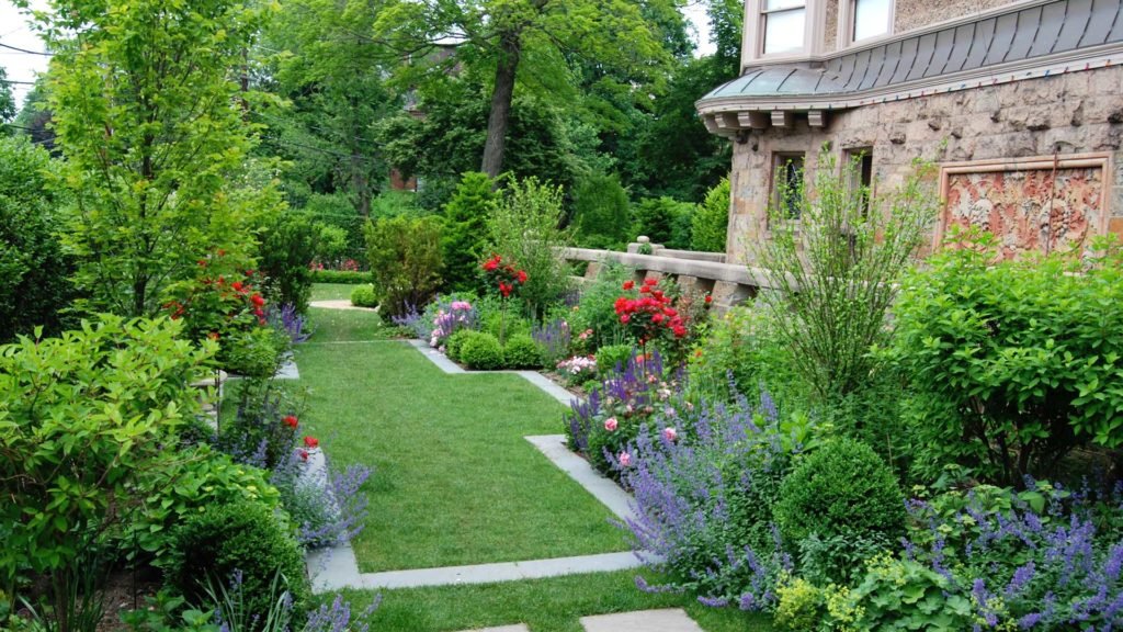 transformations - after - updated yard with plantings and gardens