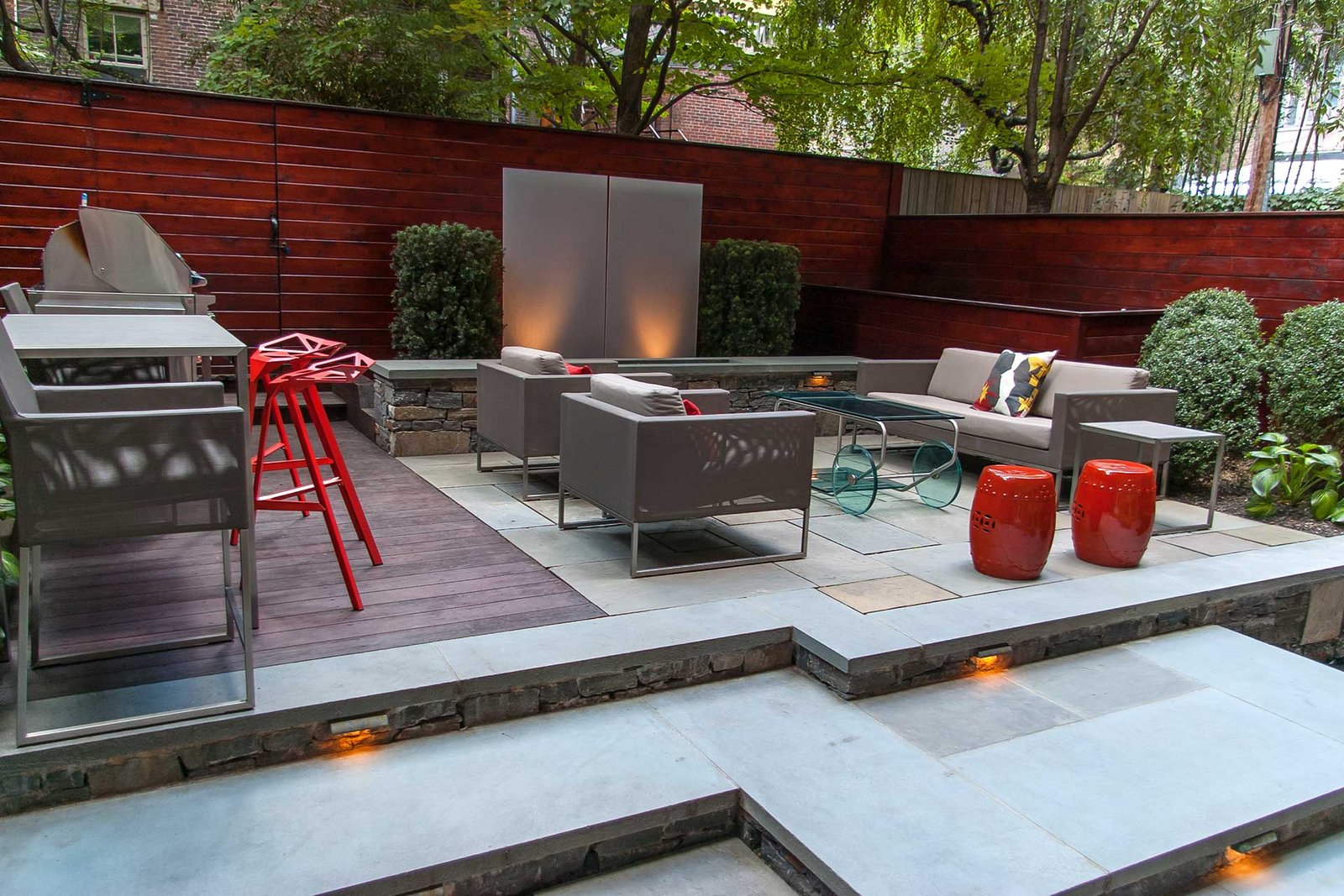 South End Boston patio with privacy fencing and seating area
