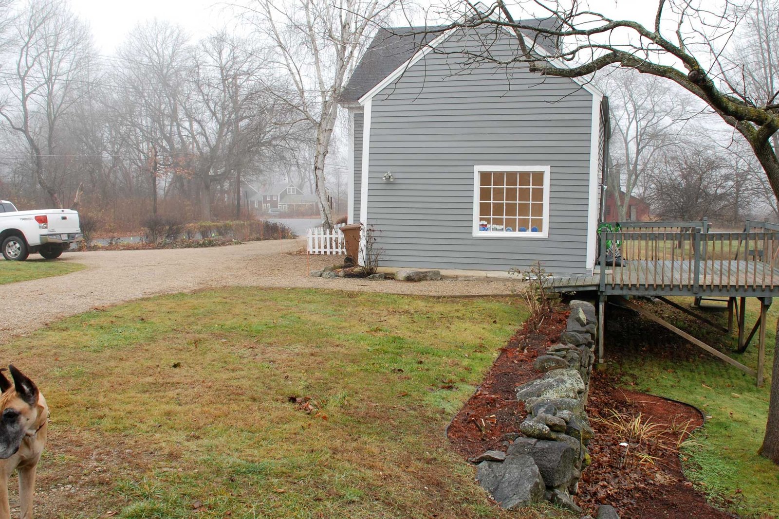 Wayland side yard before sunken patio renovation